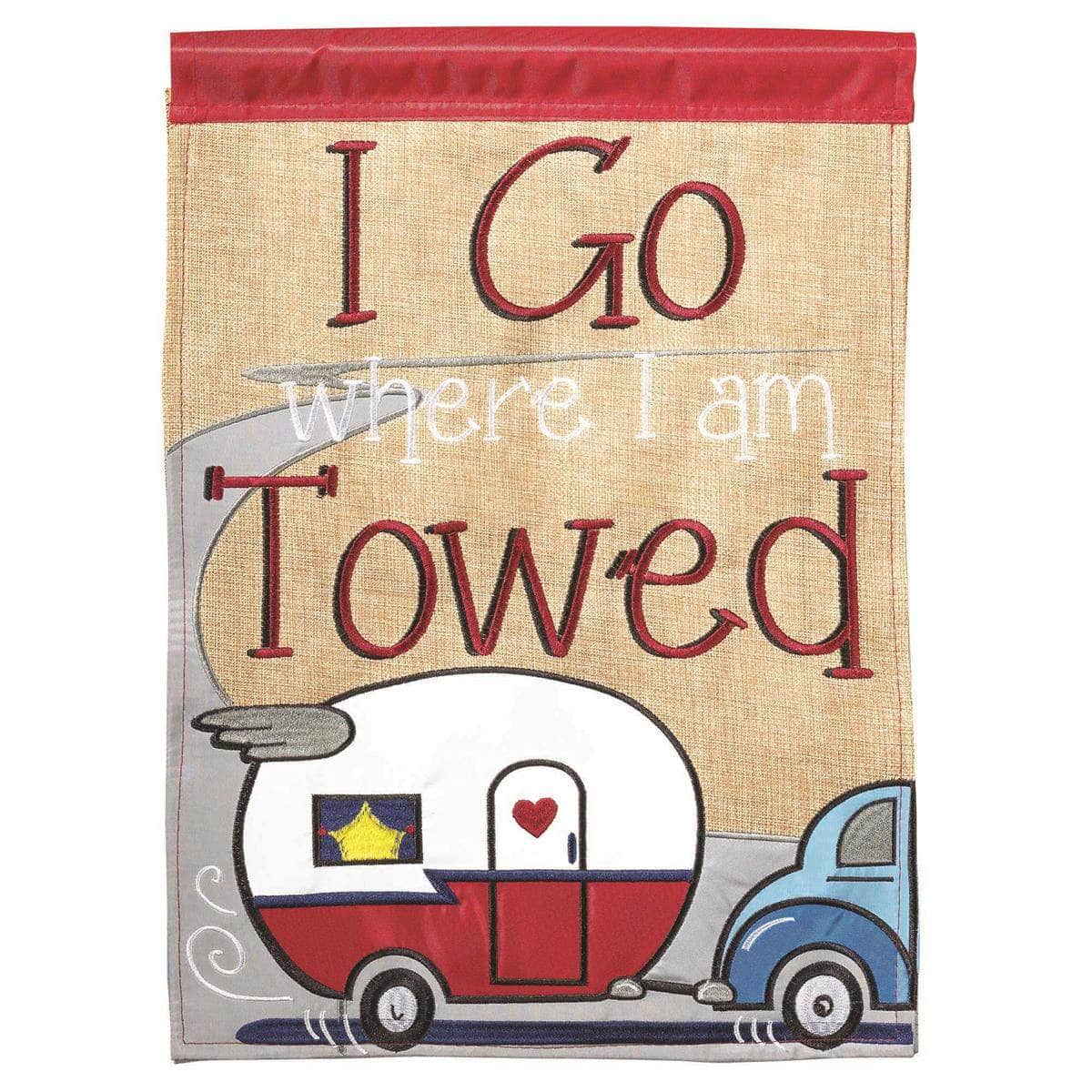 I Go Where I Am Towed Garden Flag with double-thickness design, intricate applique stitching, and durable nylon construction for travel-inspired outdoor décor.