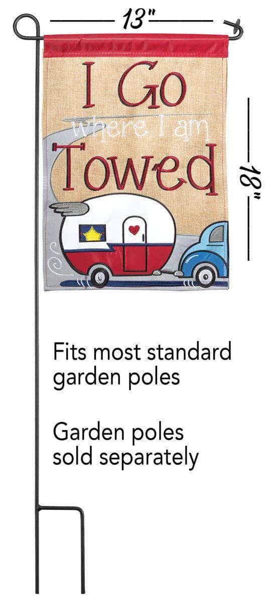 I Go Where I Am Towed Garden Flag with double-thickness design, intricate applique stitching, and durable nylon construction for travel-inspired outdoor décor.