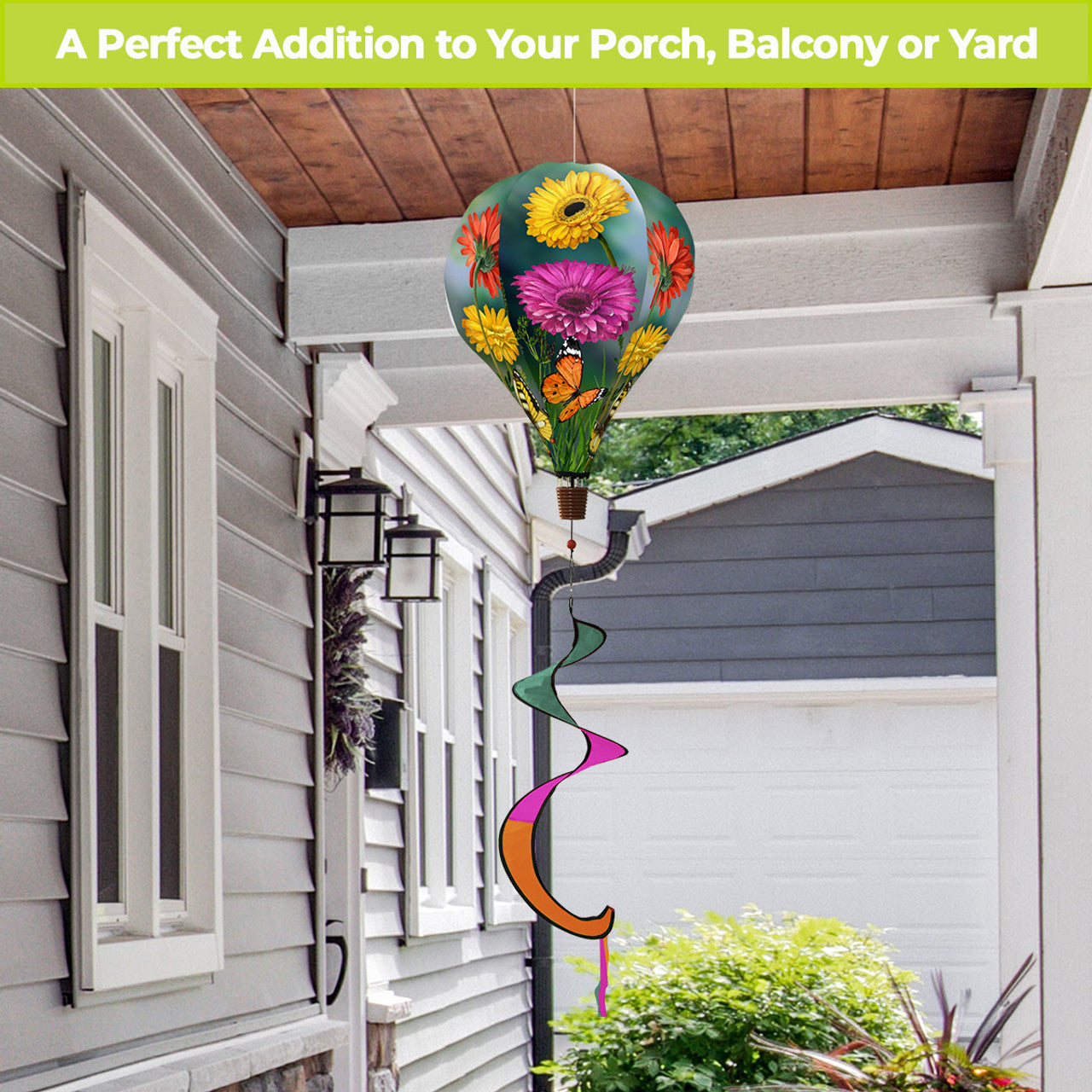 Hot air balloon spinner with butterflies and daisies, durable polyester, and flowing tail for colorful, nature-inspired spring and summer garden décor.