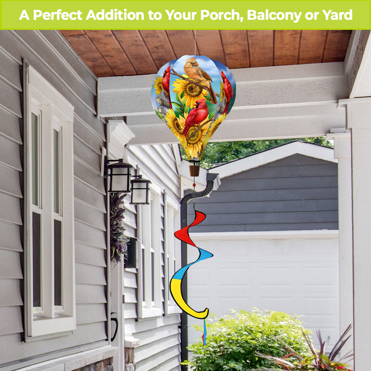 Hot air balloon spinner with bright red cardinals and golden sunflowers, made of weather-resistant polyester for colorful, breezy outdoor seasonal décor.