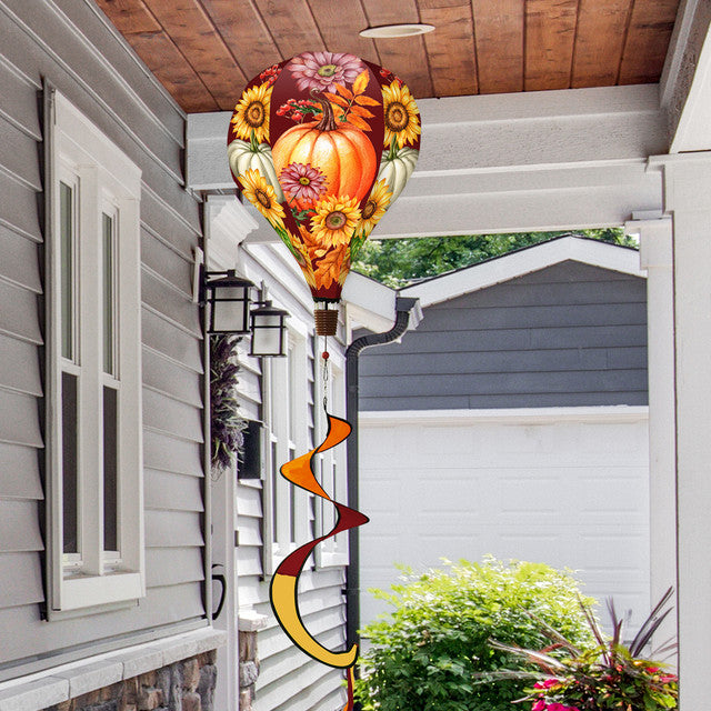 Hot air balloon spinner with colorful fall leaves and rich autumn hues, made of weather-resistant polyester for elegant seasonal outdoor garden décor.