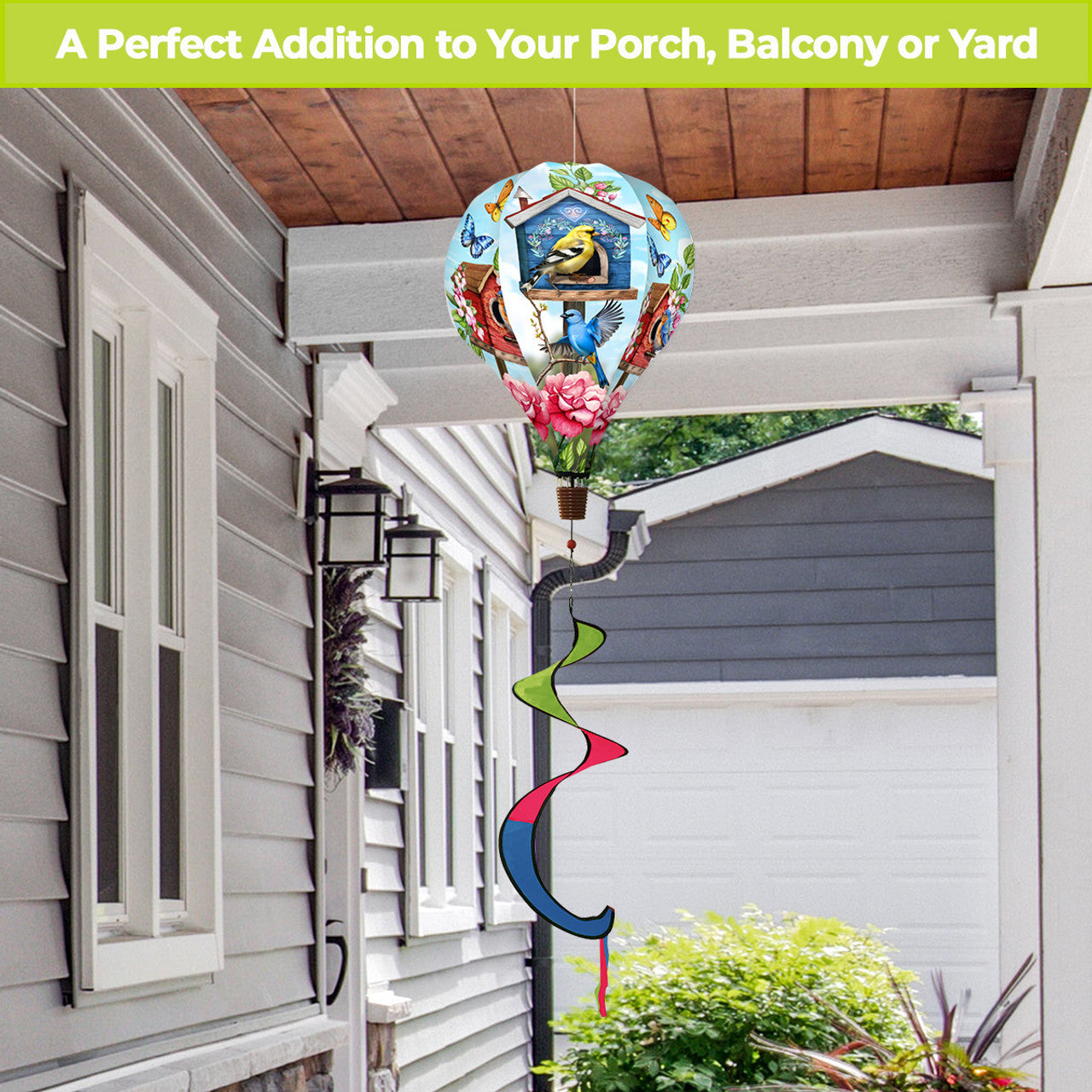 Hot air balloon spinner with blooming flowers, songbirds, and a birdhouse design, made of weather-resistant polyester for cheerful garden or patio décor.