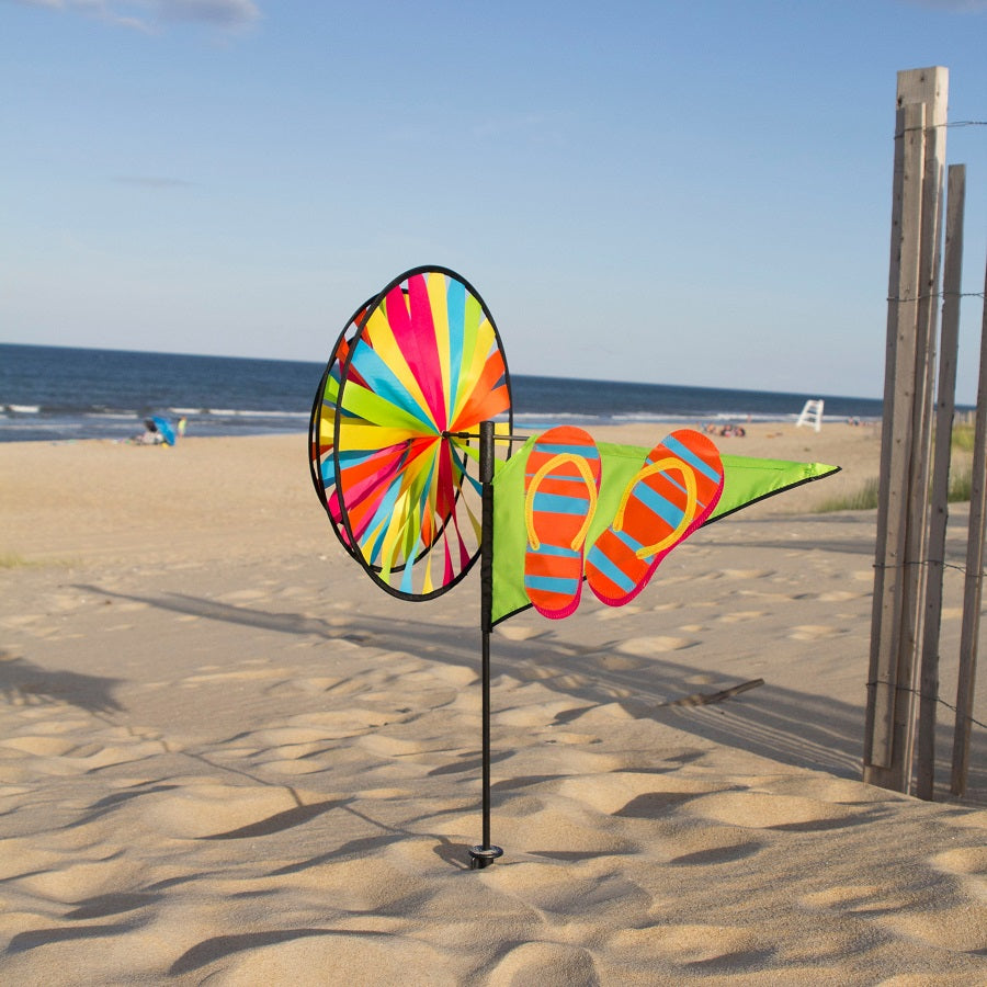 Flip Flops spinner with playful stitched applique and three counter-rotating wheels—durable outdoor décor that celebrates summer fun and relaxation.