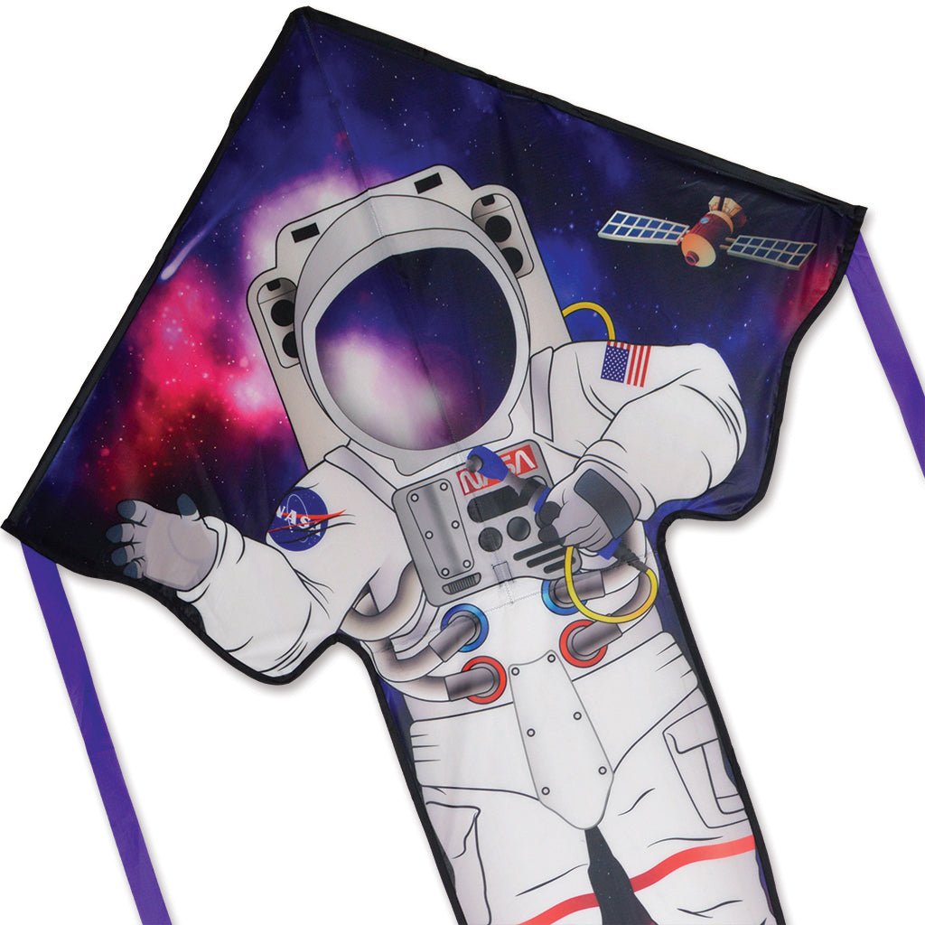 Large Easy Flyer Kite featuring a bold astronaut design, durable nylon fabric, and fiberglass frame, soaring gracefully against a clear blue sky.