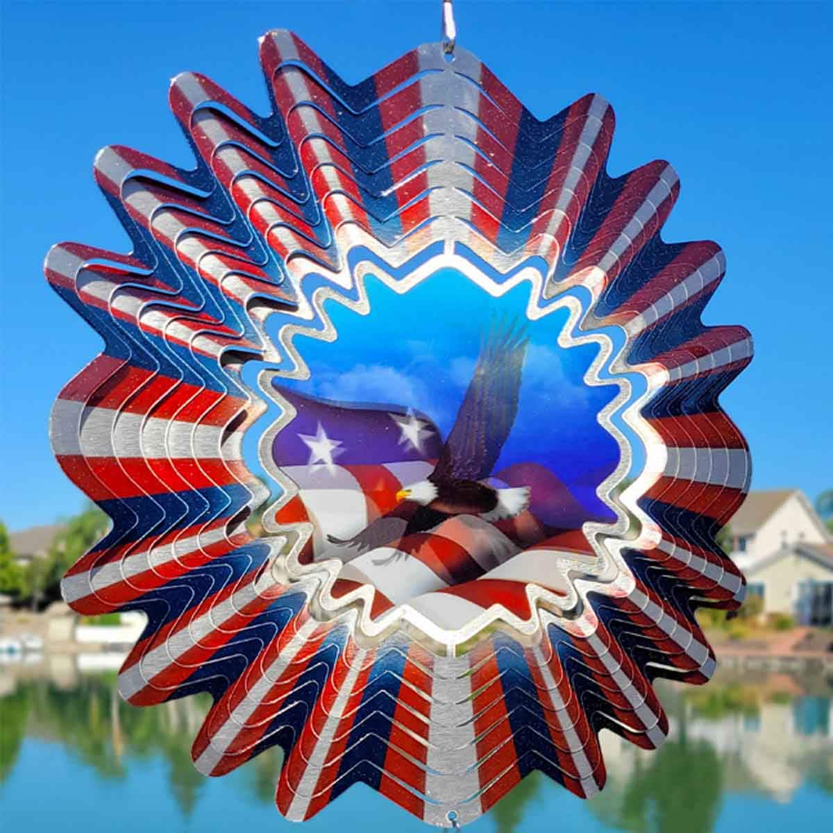12" Animated Patriotic Wind Spinner with an acrylic lenticular disc, featuring an eagle flying over a rolling flag, made for stunning outdoor décor.