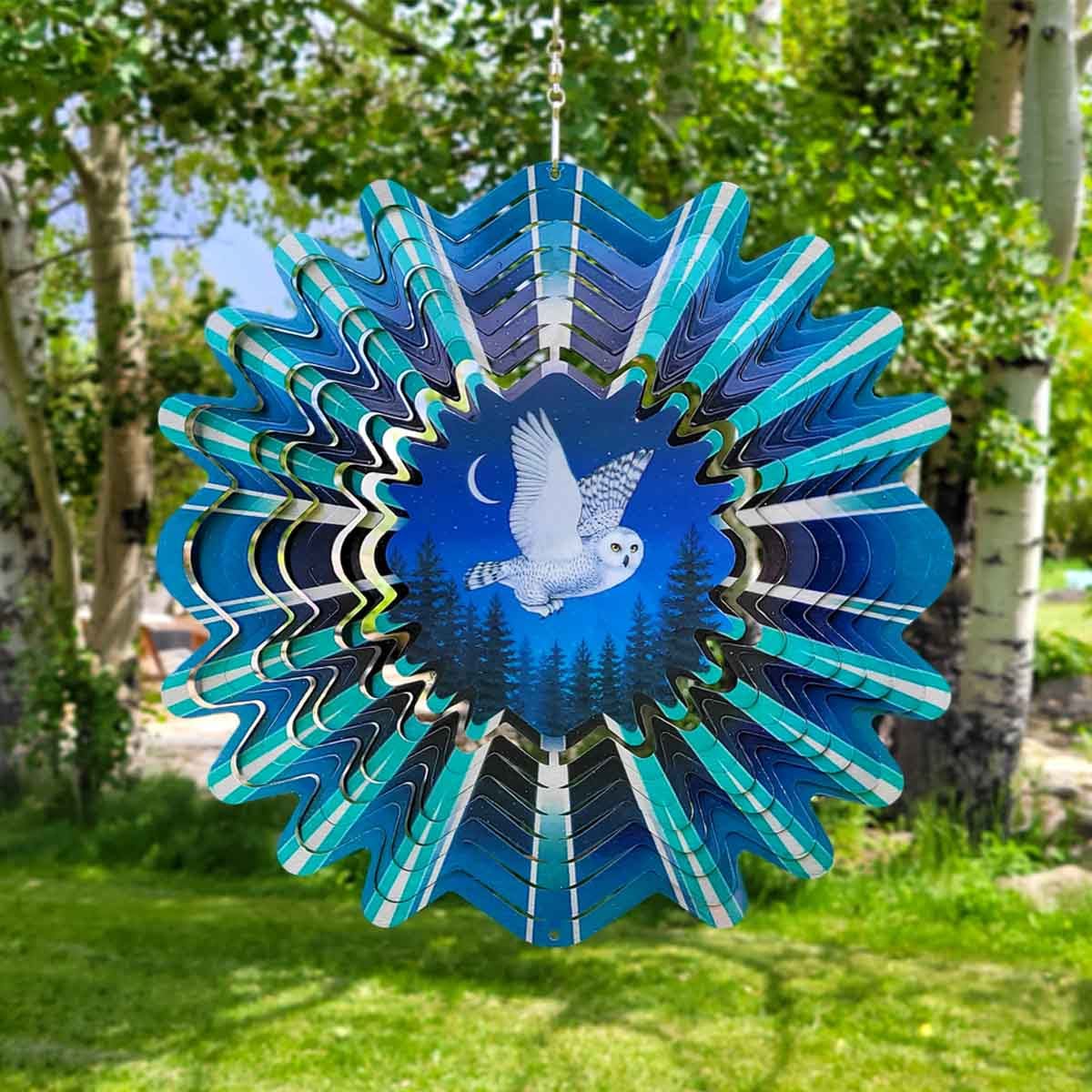 12" Animated Snowy Owl Wind Spinner with an acrylic lenticular disc, powder-coated stainless steel, and flying owl design for elegant outdoor décor.