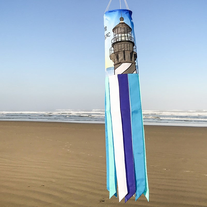 Outer Banks 40" Windsock fluttering outdoors, adding a coastal and beach-inspired flair to your garden or patio, perfect for seaside or nautical-themed settings.