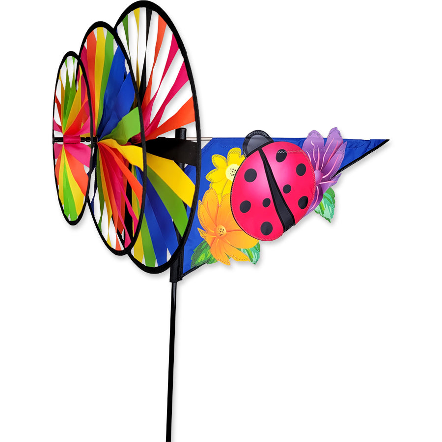 Pink Ladybug spinner with stitched applique spots and layered wheels—crafted for whimsical outdoor décor and motion-filled charm.
