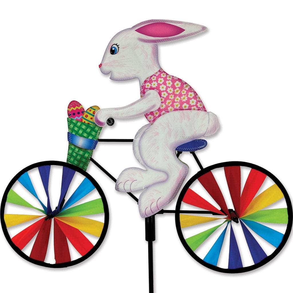 Easter bunny bike spinner with 7-inch wheels and stitched fabric detail, great for whimsical, spring-themed garden or yard decoration.