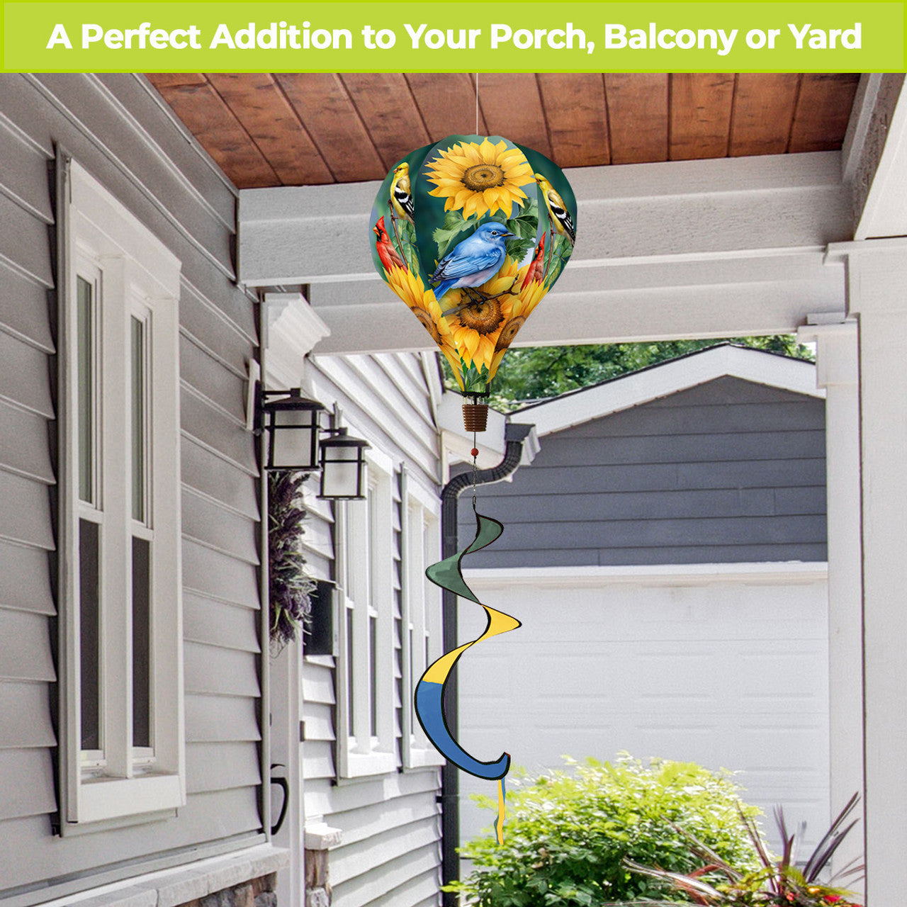 Hot air balloon spinner with songbirds and florals, durable polyester design, and breezy tail for peaceful, nature-inspired garden or patio décor.