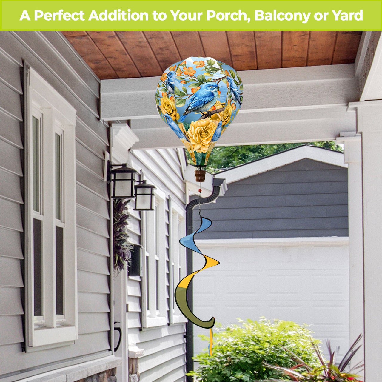 Hot air balloon spinner with pink roses and bluebirds, durable polyester build, and breezy tail for elegant, nature-inspired outdoor spring and summer décor.