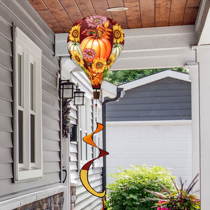 Hot air balloon spinner with colorful fall leaves and rich autumn hues, made of weather-resistant polyester for elegant seasonal outdoor garden décor.