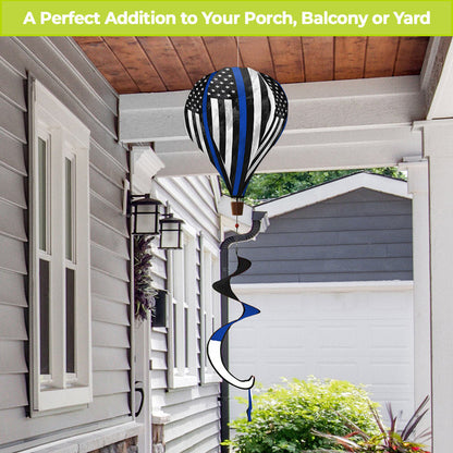 Hot air balloon spinner with patriotic tribute, stars and shield design, and swirling tail for outdoor décor that honors those who protect and serve.