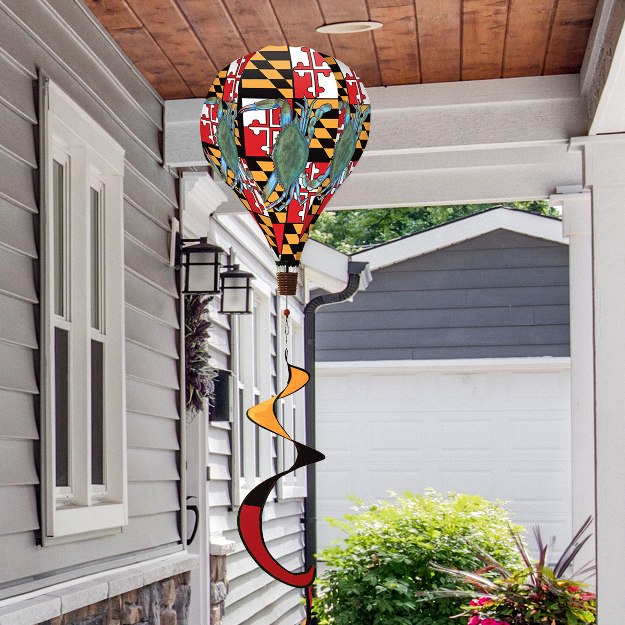 Hot air balloon spinner with bright red Maryland crabs and beachy tones, made of weather-resistant polyester for vibrant, breezy coastal summer décor.