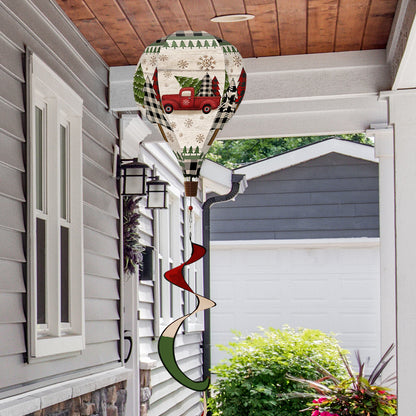 Hot air balloon spinner with red vintage Christmas truck, tree, and gifts, made of weather-resistant polyester for festive outdoor holiday garden décor.