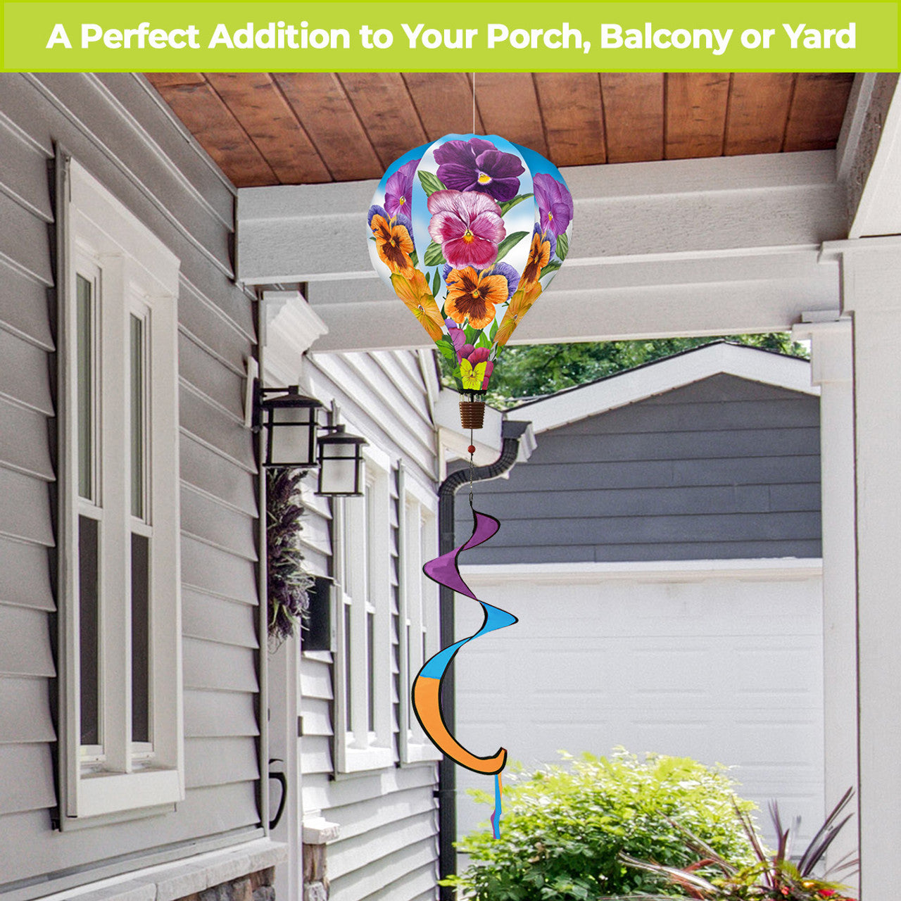 Hot air balloon spinner with vibrant pansy flowers, weather-resistant polyester, and breezy tail for elegant floral-themed spring and summer garden décor.