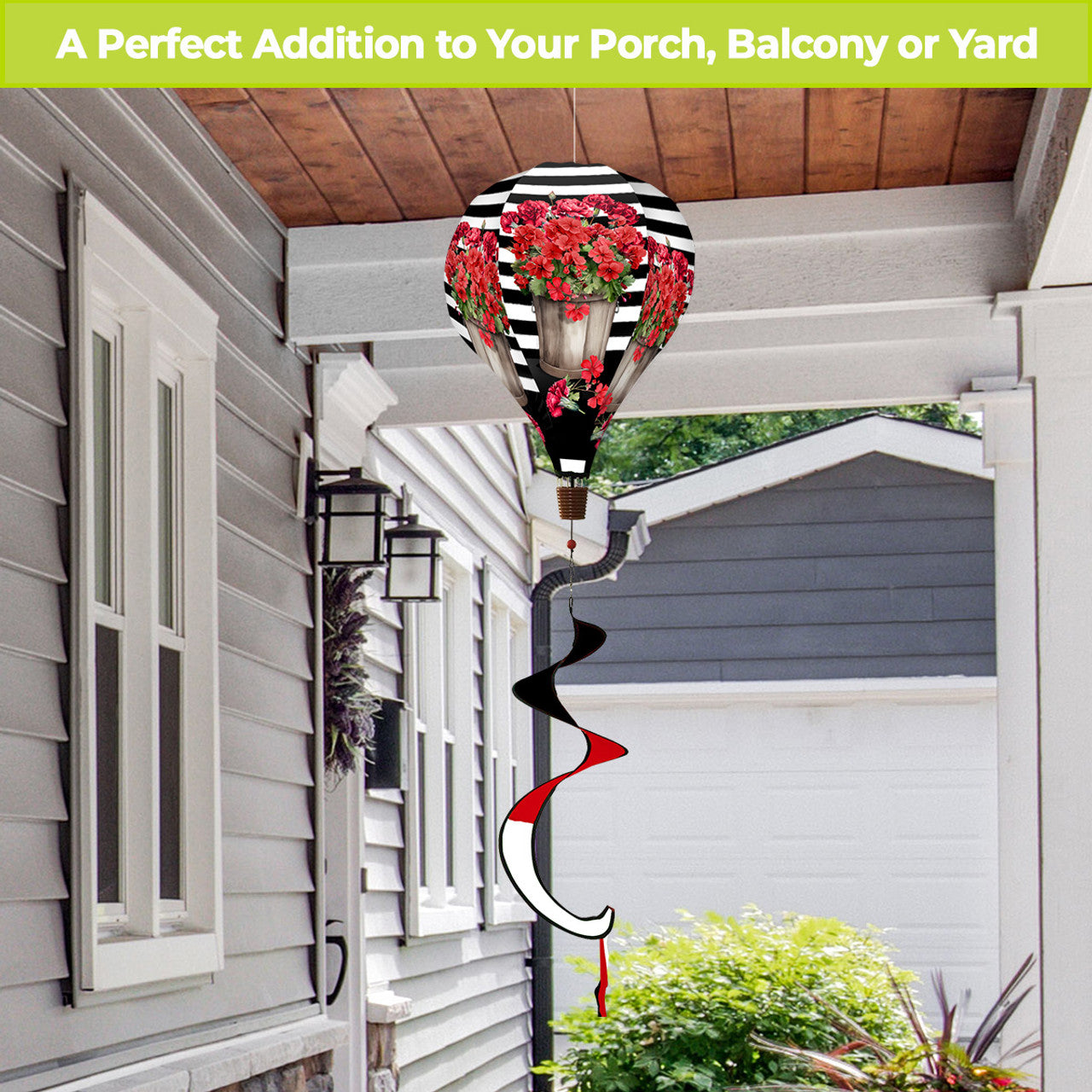 Floral hot air balloon spinner with red geraniums, striped design, and weather-resistant polyester for bright, spinning outdoor spring and summer décor.