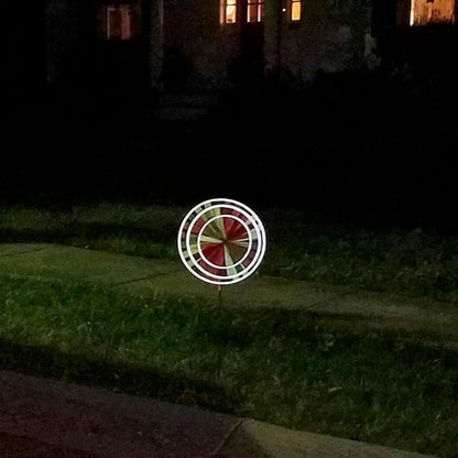Reflective triple spinner with layered wheels, fade-resistant SunTex™ fabric, and light-catching accents—perfect for bright daytime color and glowing nighttime effect.