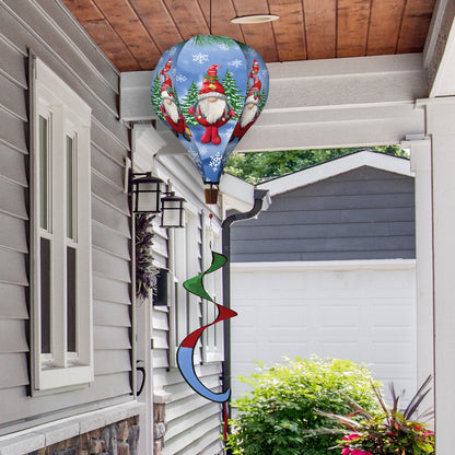 Winter gnomes hot air balloon spinner with snowflake details, wind-powered motion, and weather-resistant polyester for joyful holiday garden décor.