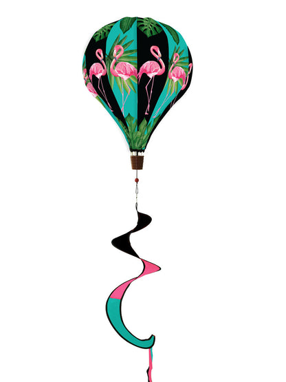 Hot air balloon spinner with pink flamingos and tropical greenery, made of weather-resistant polyester for colorful, breezy outdoor summer garden décor.