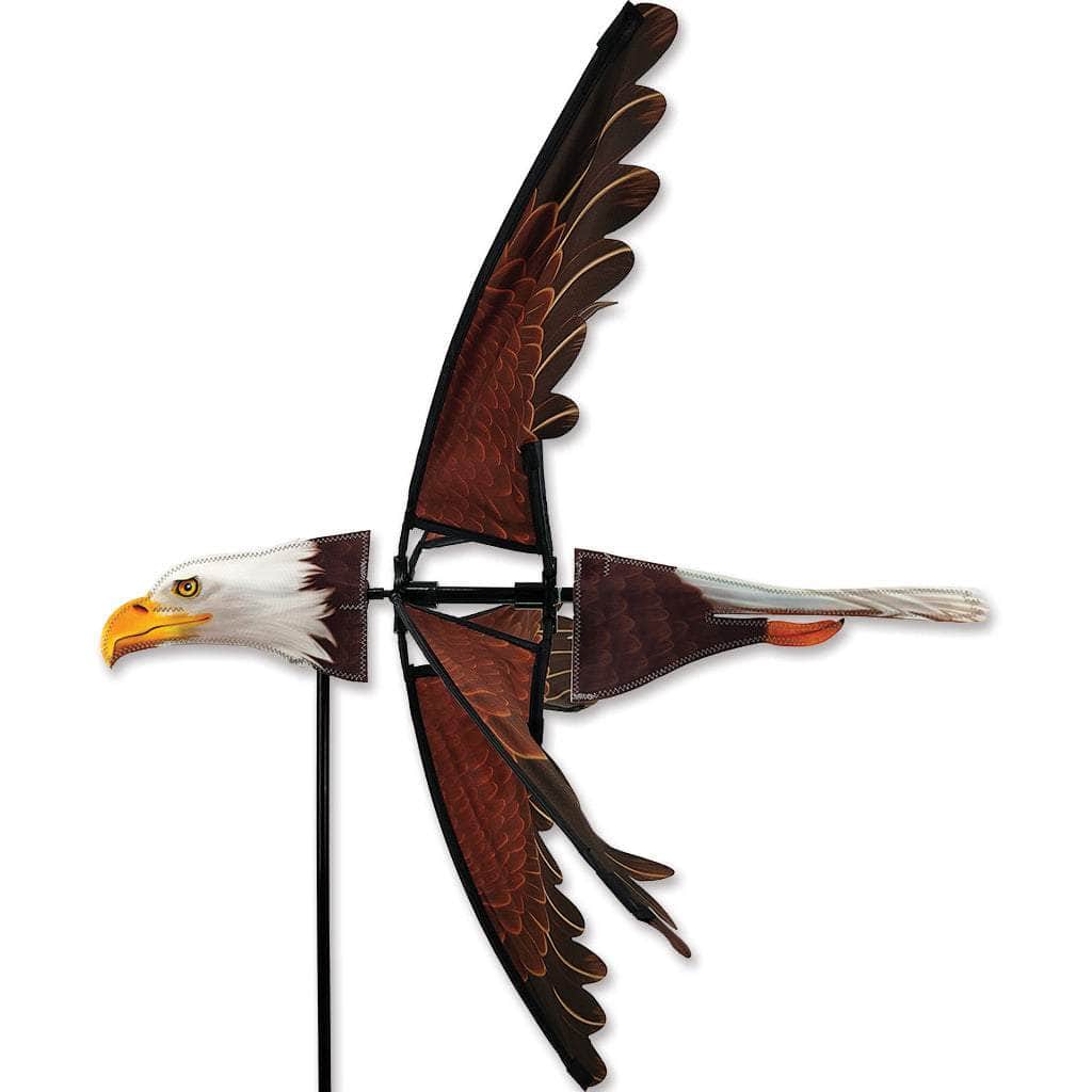 Flying eagle spinner with layered applique, 26-inch rotating wing, and bold patriotic styling for a powerful outdoor garden centerpiece.
