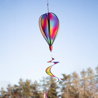 Jewel 6-Panel Hot Air Balloon displayed outdoors, showcasing its radiant jewel-inspired colors against a picturesque sky.