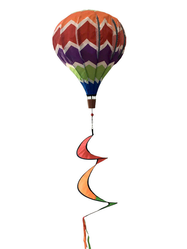 Hot air balloon spinner with rainbow panels and breezy motion, crafted from weather-resistant polyester for bold, colorful outdoor garden or patio décor.