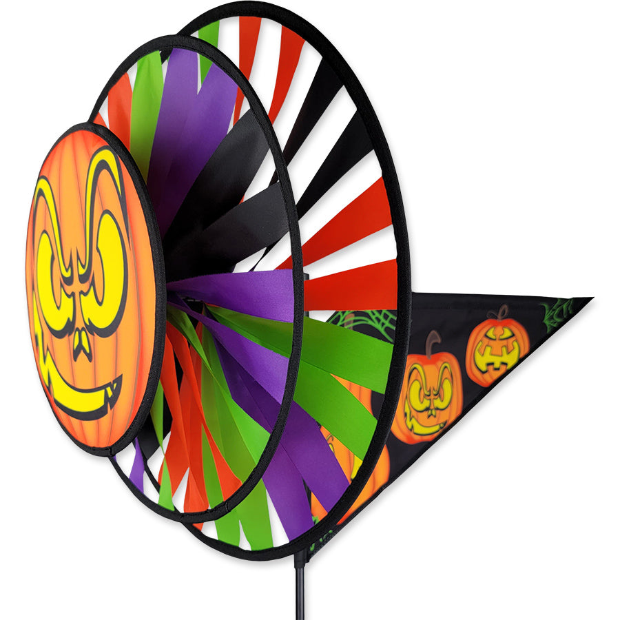 Jack O’Lantern spinner with stitched pumpkin faces and layered spinning wheels—durable Halloween decoration for festive outdoor displays.