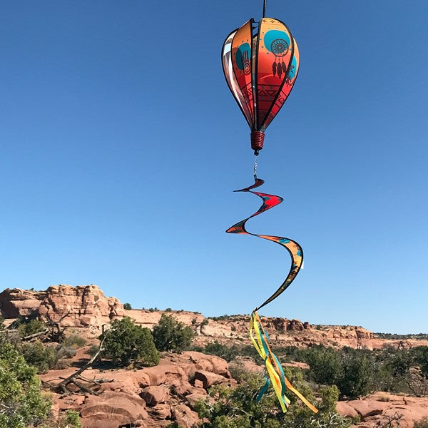 S.W. Icons 6-Panel Hot Air Balloon soaring outdoors, showcasing its vibrant Southwestern patterns against a beautiful open sky.