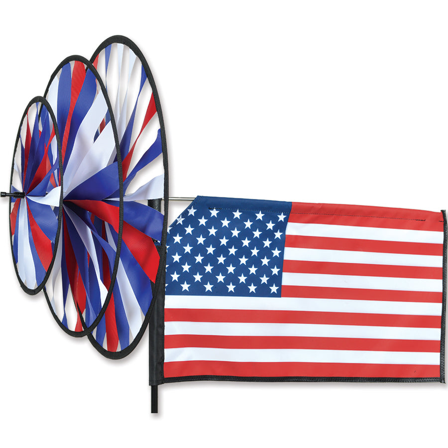 American Flag spinner with stitched applique stars and stripes, triple spinning wheels, and durable fabric—ideal for year-round patriotic displays.