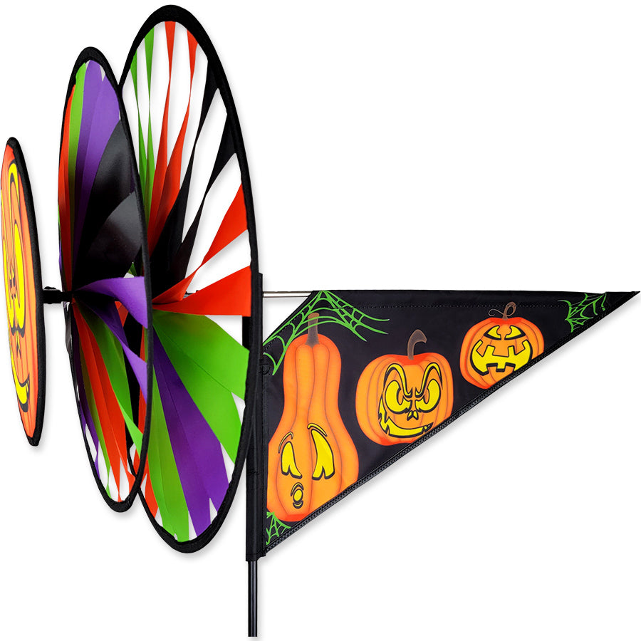 Jack O’Lantern spinner with stitched pumpkin faces and layered spinning wheels—durable Halloween decoration for festive outdoor displays.