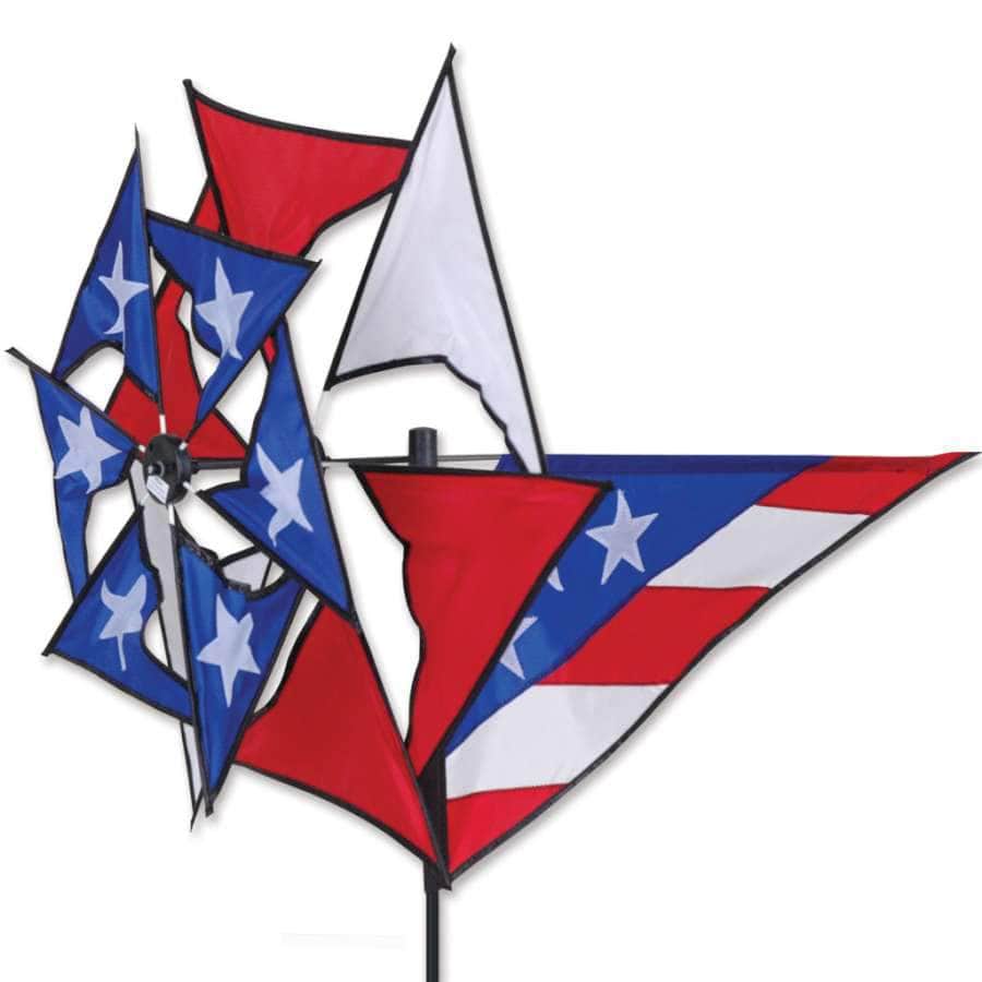 Patriotic windmill spinner with red, white, and blue layered fabric and smooth 21-inch spinning wheel for festive motion in gardens or yards.